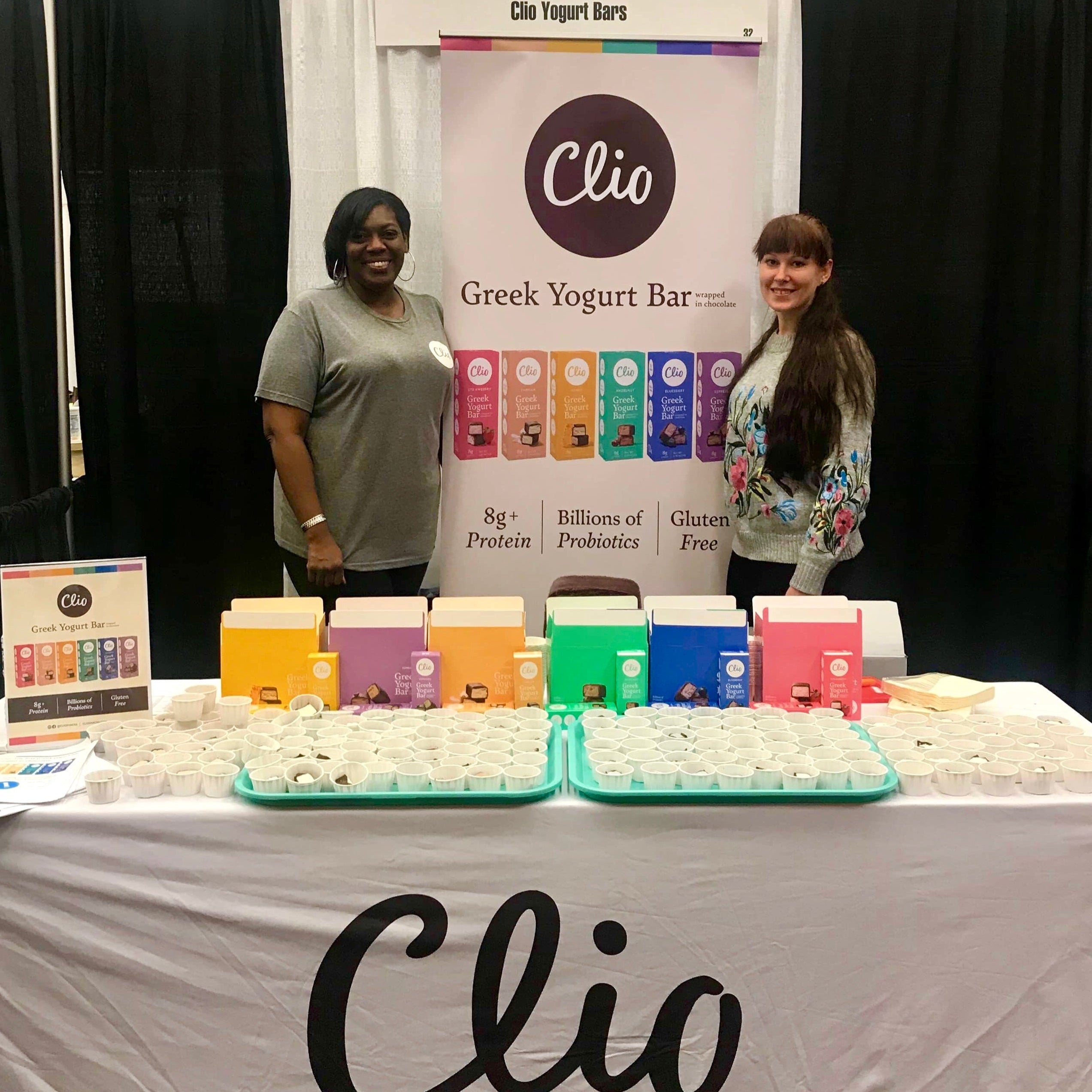 The early Clio team at a trade show booth